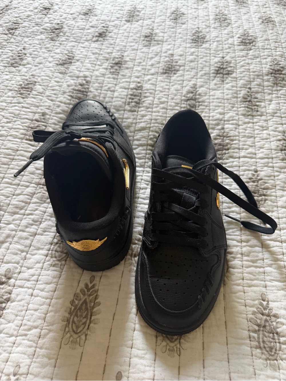 Jordan Black Sneakers with Gold Accents